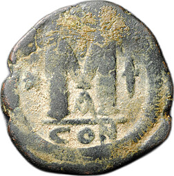 Монета Фоллис 527 - 538 Юстиниан I Бюст в диадеме вправо Византия